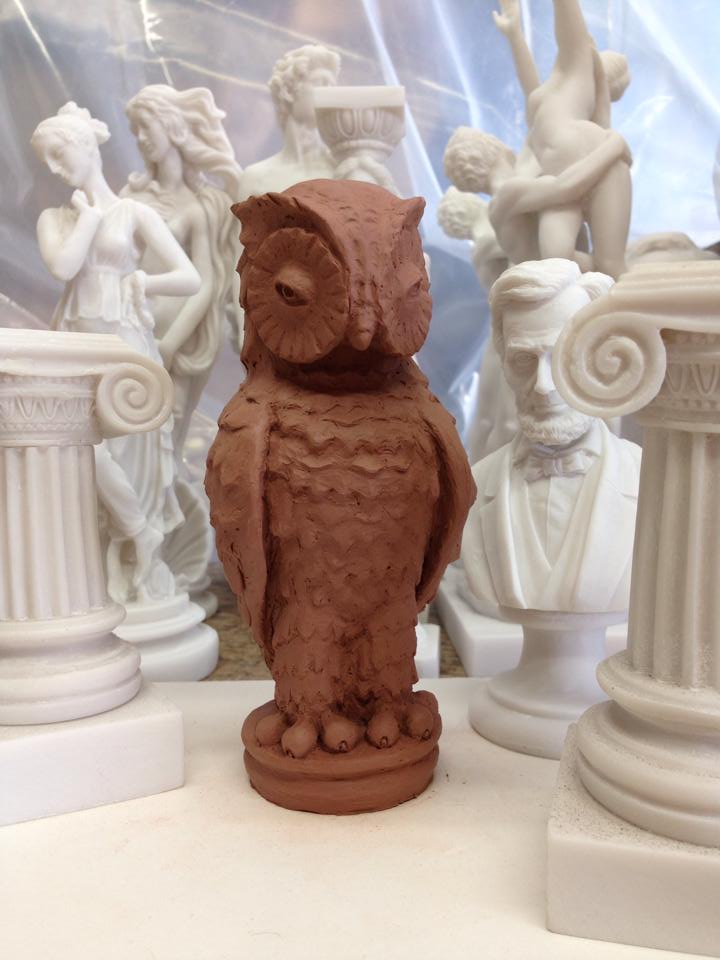 regis-high-school-owl-statue