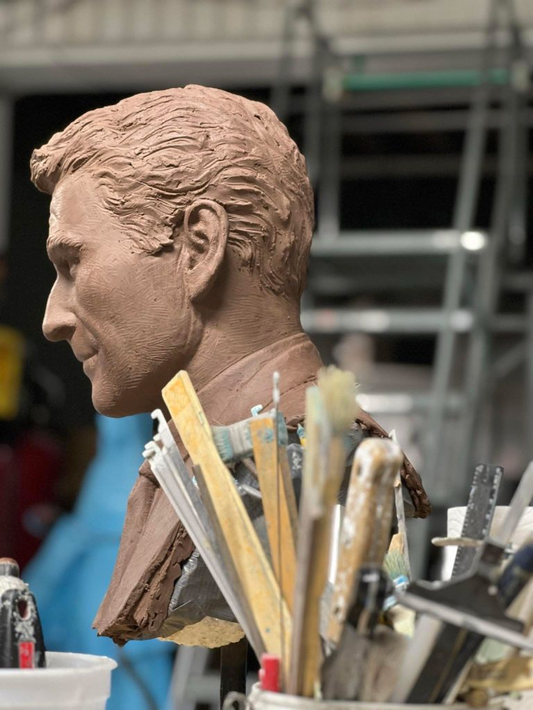 Full-scale clay portrait of Rod Serling being refined in the Statues.com sculpture studio