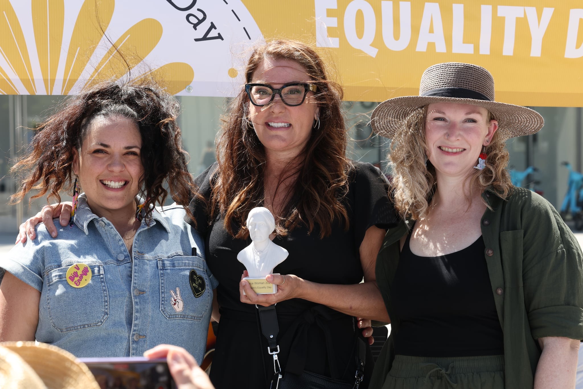 Group photo at the Fierce Women Awards 2024 in Long Beach, featuring Vice Mayor Cindy Allen holding a Susan B. Anthony bust from Statues.com’s SculptHER Collection on Women’s Equality Day.