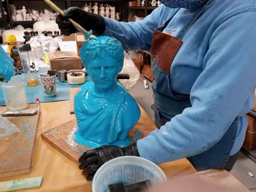 Mold-making stage of bronze casting