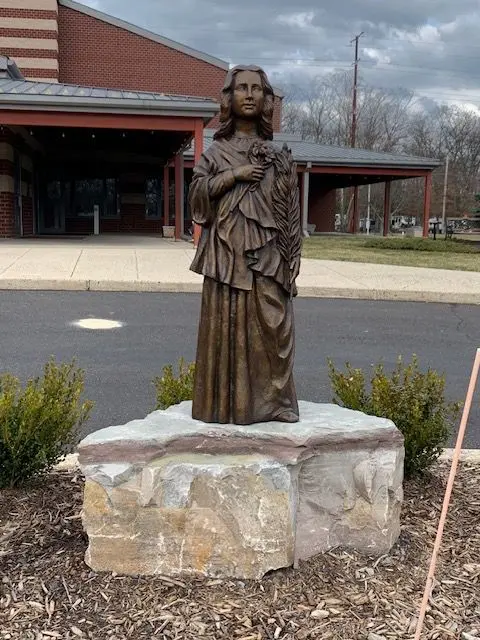 Foundry-cast bronze statue installed outdoors