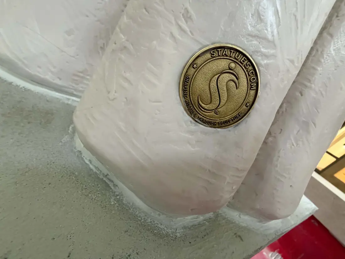 Statues.com seal detail on the Metropolitan Orestes Chornock sculpture